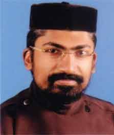 Fr. Tiju Thomas (John Thomas)